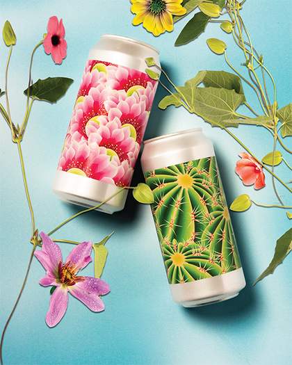Beer cans layed out with flowers