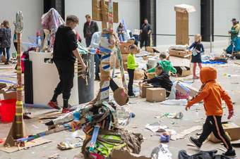 people make sculptures with cardboard in the turbine hall