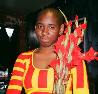 A woman holding flowers