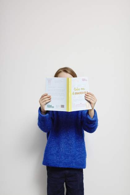 child reading a book