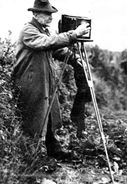 F.C. Tyler Alfred Watkins photographing Eastcombe Cross, April 1926