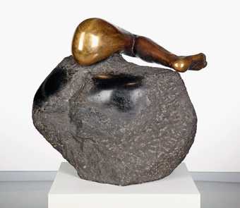 Alina Szapocznikow leg 1965 bronze leg embedded in a round lump of granite rock