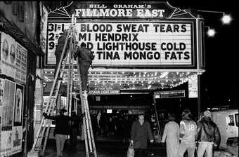 Amalie R Rothschild Changing the Fillmore East signs at the end of the Blood Sweat and Tears show 28 December 1969