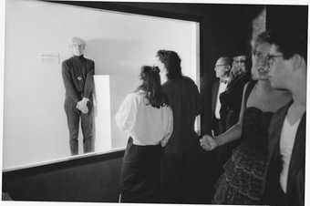 Andy Warhol posing as Invisible Sculpture, New York City, 1985, photographed by Paige Powell - (c) Paige Powell