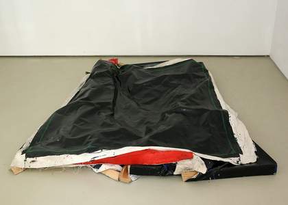 Angela de la Cruz Clutter I 2003 broken painting canvases places on top of each other on the floor