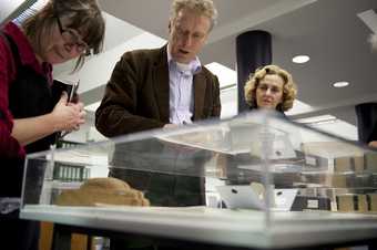 Visitors explore material from Tate's archive as part of a learning event