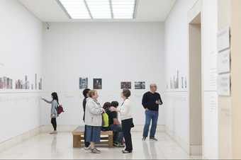 Archive Explorer in conversation with visitors in Tate Britain gallery
