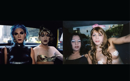 two people sit in a taxi and stare at the camera 