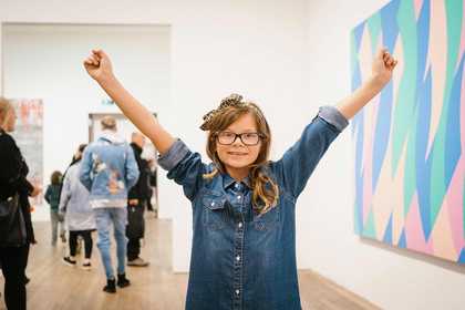 girl with arms up
