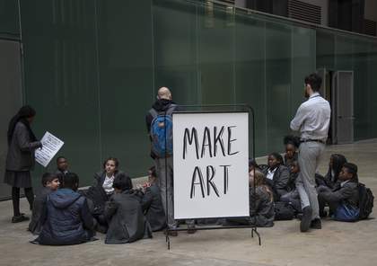 Young people outside the Clore Hub