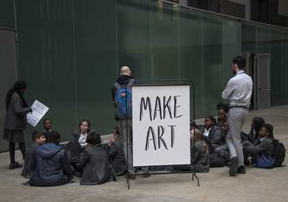Young people outside the Clore Hub