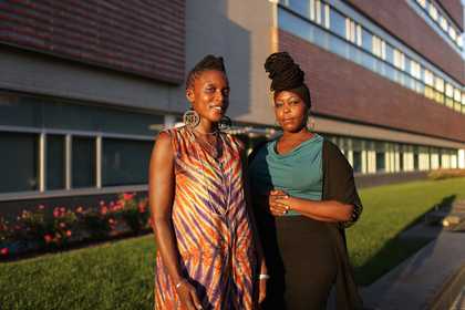 Picture of two women outside of a building