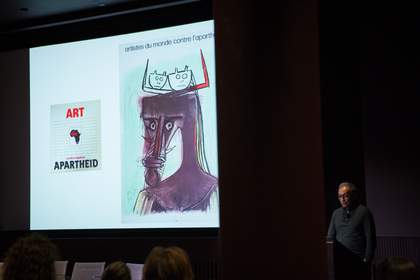 Artist and curator Gavin Jantjes delivering a talk in the auditorium at Tate
