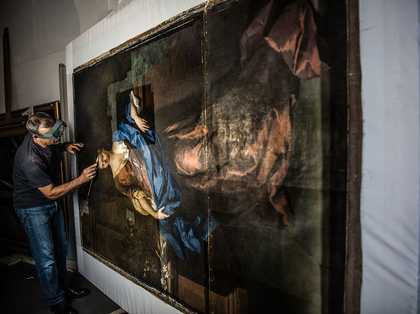 A conservator restoring Michael Dahl’s portrait Rachel Russell, Duchess of Devonshire c1696