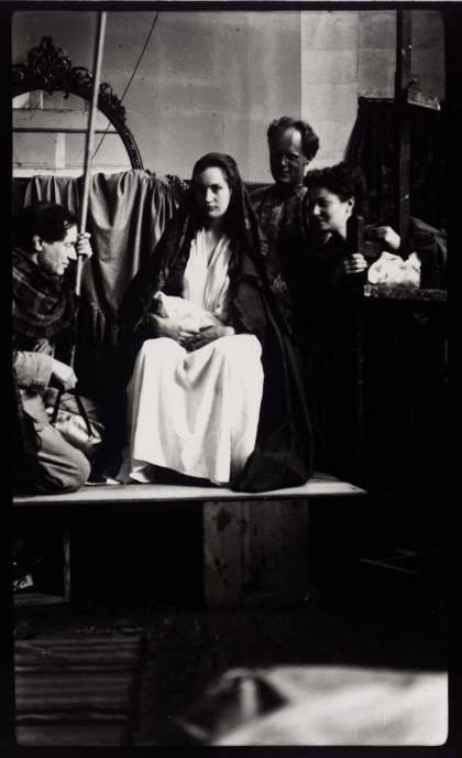 Photograph of Duncan Grant, Angelica and Quentin Bell, and Chattie Salaman posing for the Berwick Church murals, Tate Archive