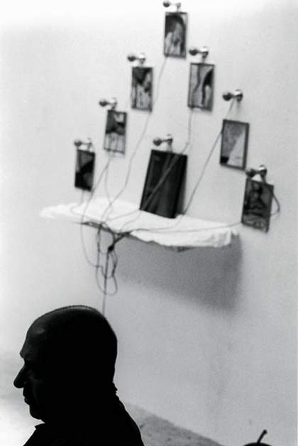Christian Boltanski, silhouette with work in backdrop