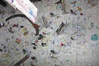 A birds eye view of the floor of the turbine hall during Mega Please Draw Freely, covered with drawings 