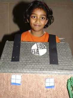 Kid wearing his house