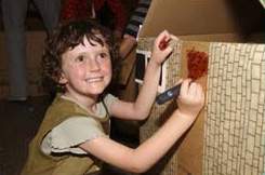 Kid making her house