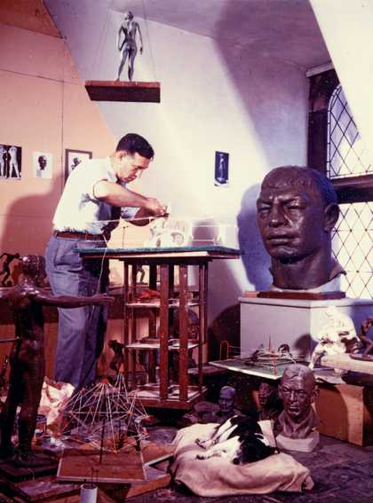 Joseph Brown working on model of play sculpture Whale Yard, c1954
