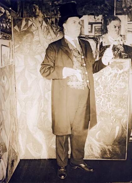 David Burliuk posing for a photograph in New York