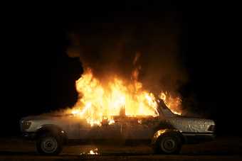 ​SUPERFLEX The Burning Car 2008, film still. Courtesy the artists