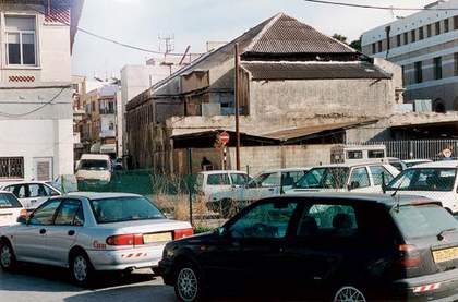 Jean-Marc Bustamante S.i.M (Something is Missing) 04 (black and silver car on street) 1997