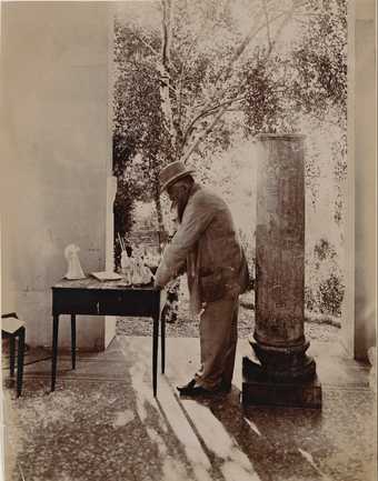 Rodin working under the peristyle of the Pavillon de l’Alma in Meudon c.1912. Photo by Jean Limet