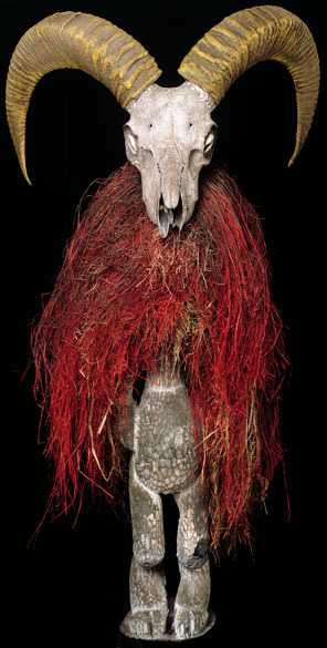Jake and Dinos Chapman Chapman Family Collection 2002 carved figure with a ram's skull for the head with dyed red hair around the neck