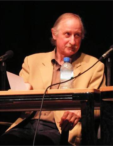 Charles Harrison seated