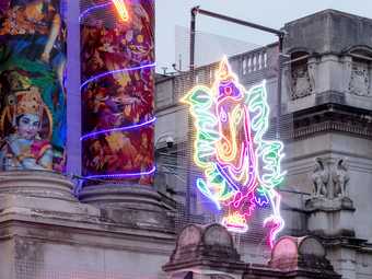Ganesh in neon on the facade of Tate Britain 