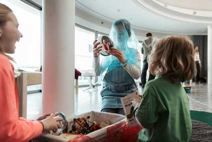 Children having fun with costumes and mirrors