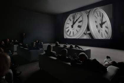 Audience watching The Clock