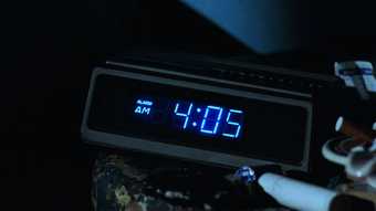 an image of a digital clock showing 4:05 AM
