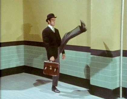 John Cleese in Monty Python Ministry of Silly Walks sketch
