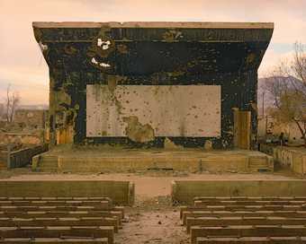 Simon Norfolk, Bullet scarred cinema at the Palace of Culture in the Karte Char district of Kabul, 2003