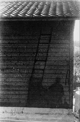 Matsumoto Eiichi, Shadow of a soldier remaining on the wooden wall of the Nagasaki military headquarters, 1945