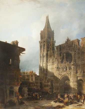 A painting of one tower of Rouen Cathedral in the corner of a square, which is cast in shadow by buildings on the left.