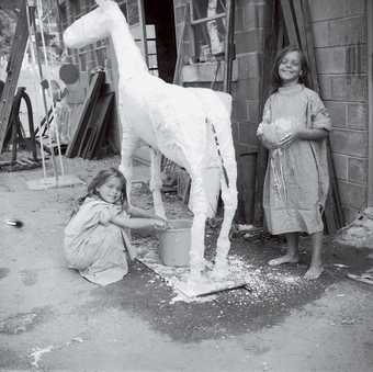 David Smith Rebecca (left) and Candida Smith modelling a plaster horse, Bolton Landing c.1961