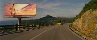 a motorway with a billboard advertisement