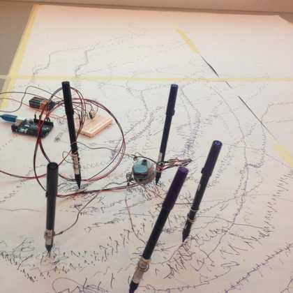 Side view of the results and equipment made on the digital makers drawing workshop, showing sketchy lines and battery circuits