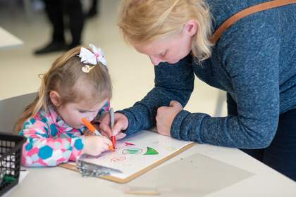 Child and mother drawing