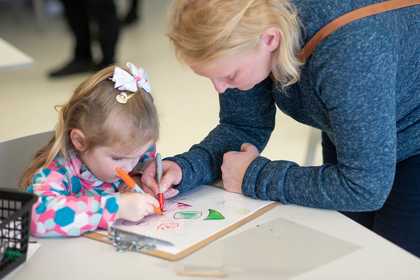 Child and mother drawing