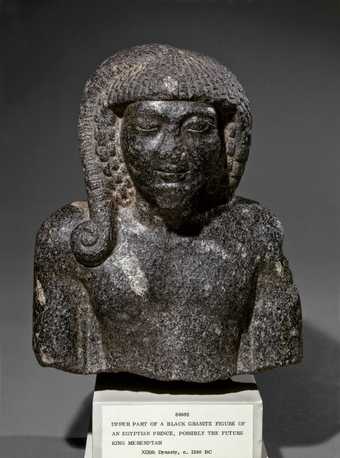 Granodiorite statue of a royal prince, wearing the sidelock of youth, 19th dynasty (1307-1196 BC)