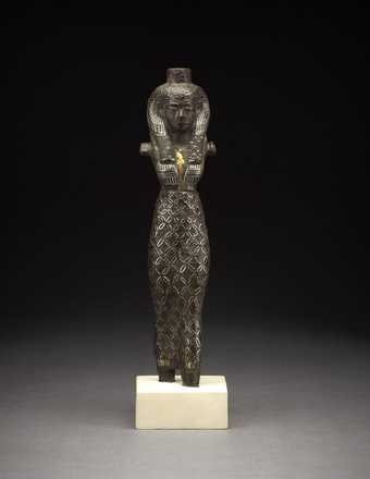 Copper alloy figure of a queen or divine consort, inlaid with gold detail, Third Intermediate Period (1069-664 BC)
