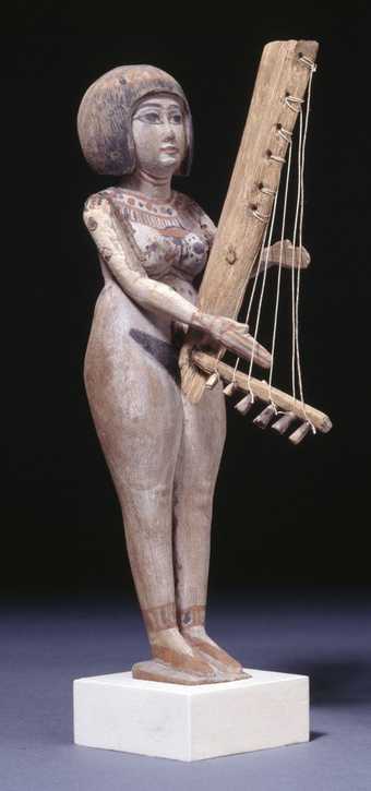 Painted wooden figure of a female harpist, Late Period (664-332 BC)
