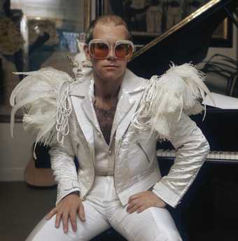 A photograph of Sir Elton John by photographer Terry O'Neill