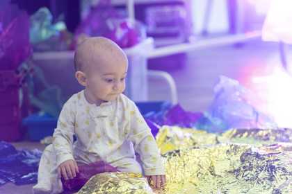 photograph of child taking part in the workshop 'Under 5s Explore: The Elements'