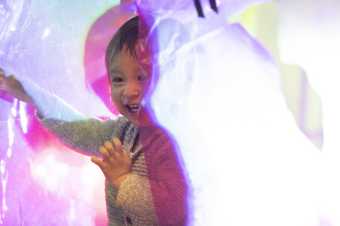 photograph of child taking part in the workshop 'Under 5s Explore: The Elements'