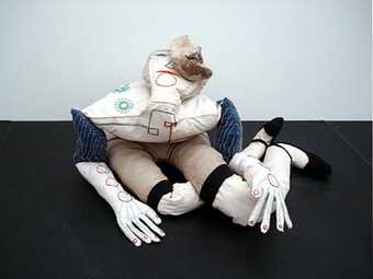 Enrico david Wayne Shire 2007 crumpled stuffed figure placed on the floor